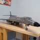 Illustration for article titled Giant LEGO B-1B Bomber Escorted by Fighters, Hawkeye Aircraft